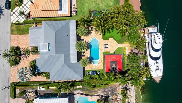 Aerial view of the estate, pool and yacht dock
